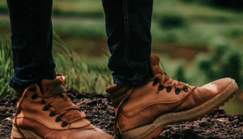 Close-up of brown leather boots outdoors